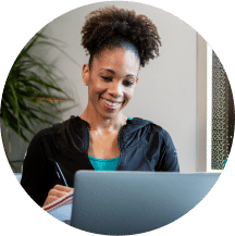 a person studying for the ace personal trainer certification exam located on the ace fitness personal trainer certification webpage